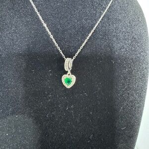 Elegant Silver Necklace with Green Heart Pendant